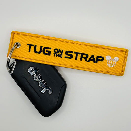 Tug on the Strap Keychain